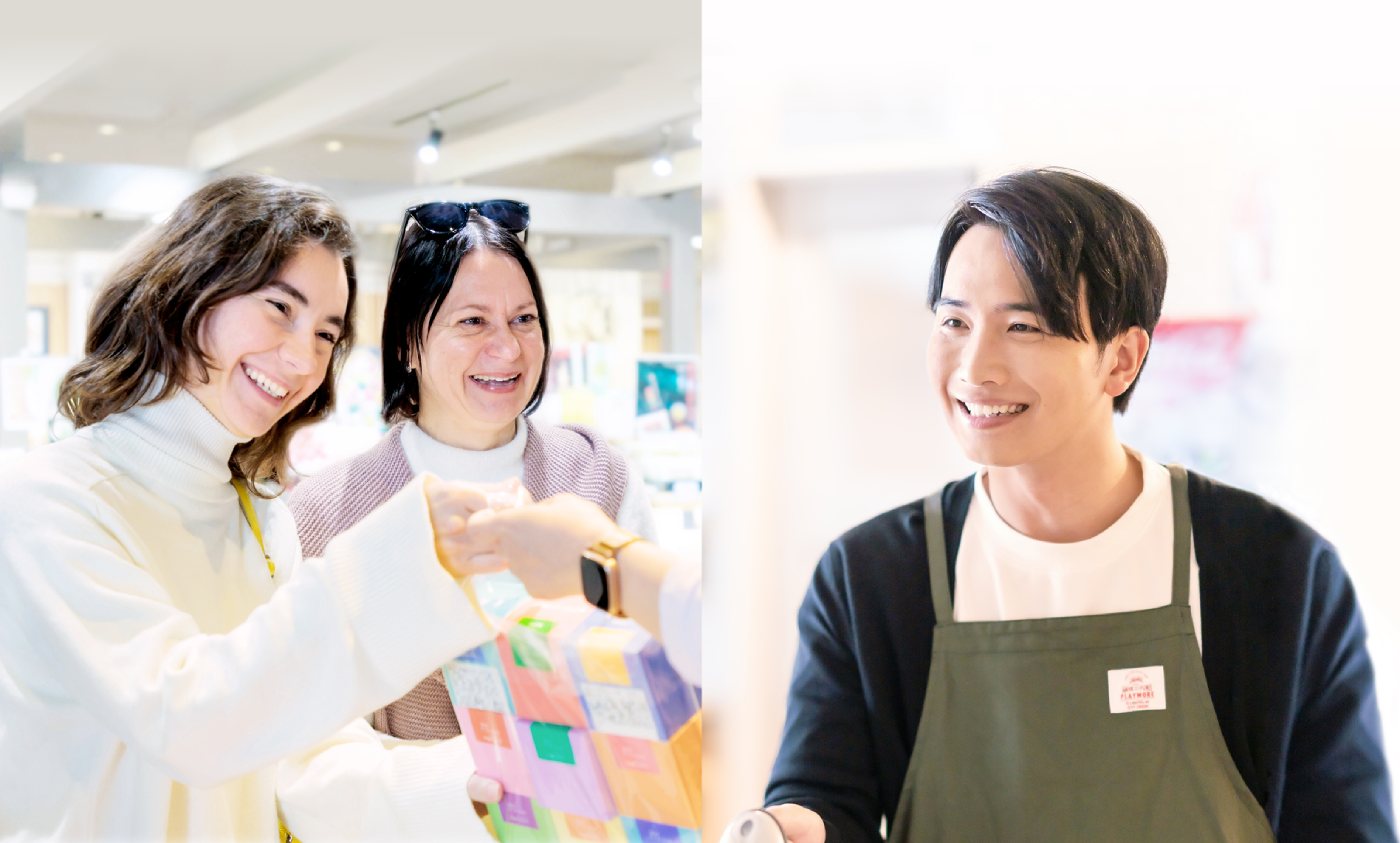 笑顔で買い物をする訪日外国人観光客と会計をする店員